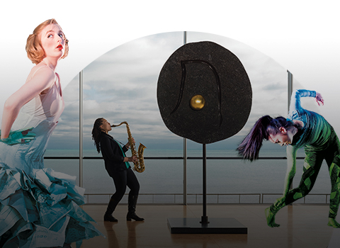 Dancers, sculpture, and a saxophone player