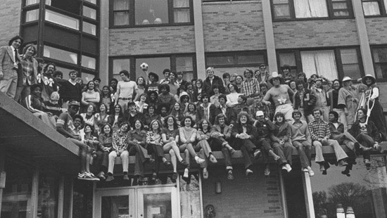 1970s - Students sitting on the exterior of Elder Hall, which was one of several residence halls built to ease Northwestern's housing shortage between 1950 and 1970. 