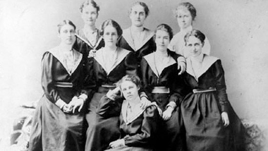 1898 - Photo of the Women's Basketball Team. While female students engaged in some forms of physical activity, their athletic endeavors were closed to spectators.